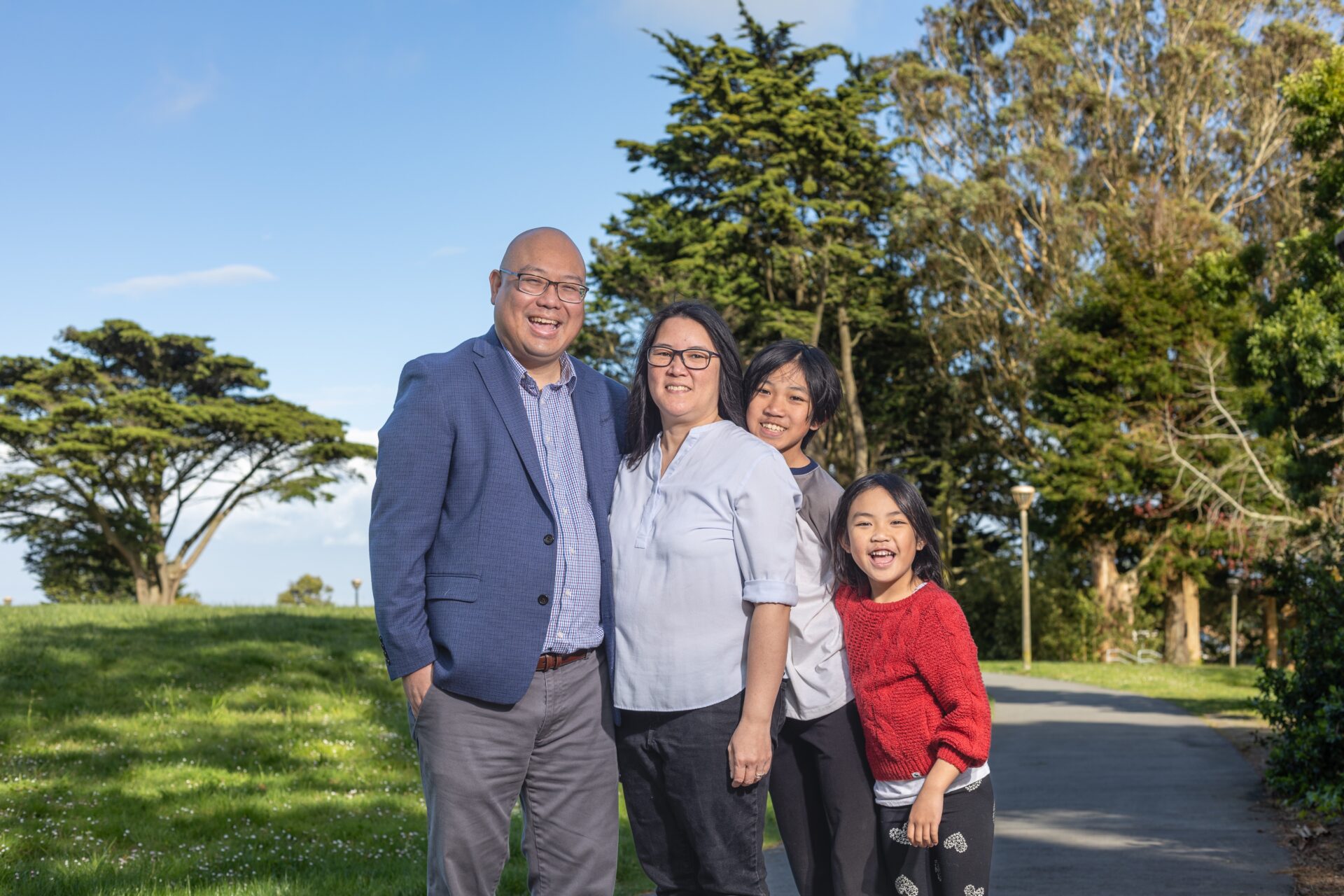 Mark Nagales with his wife Amy, son Aidan, and daughter Josephine in Westborough Park, South San Francisco, 2024.
